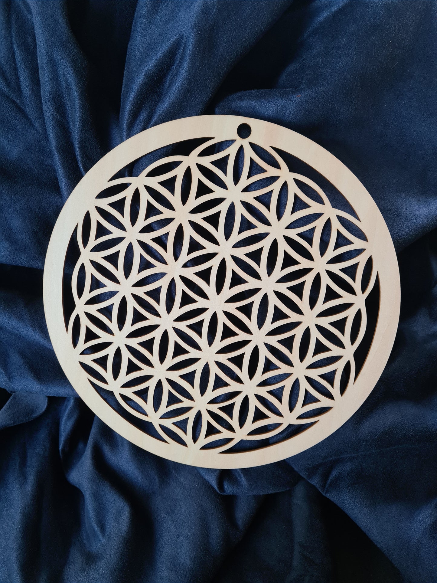 wood carved flower of life